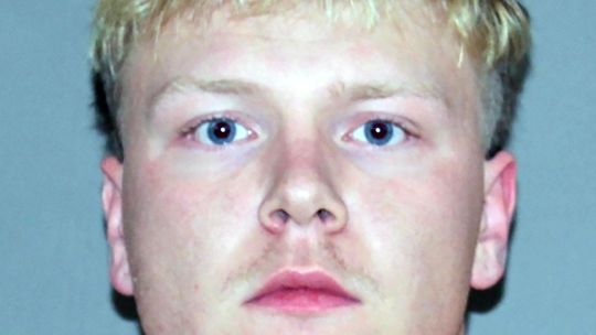 AISD coach arrested on three counts