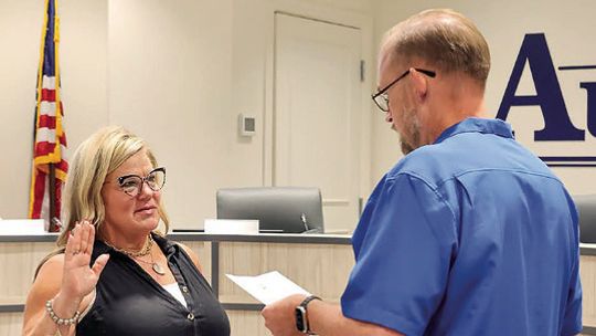 Aubrey swears in new council member