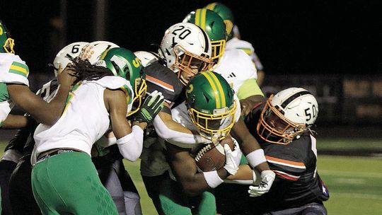 Bearcats smother Trojans at home