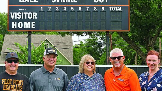 Local bank sponsors new scoreboard