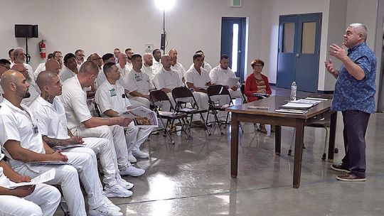 Quin shares message of peace with inmates