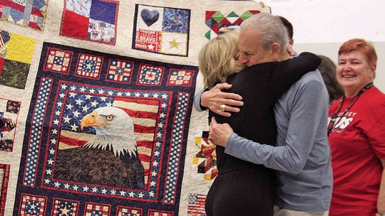 Team honors fellow teacher's life, service